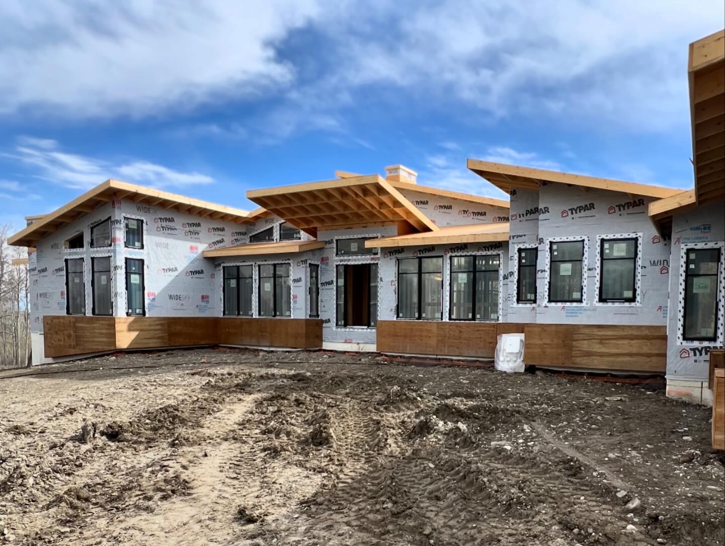 Front elevation of a contemporary residence under construction